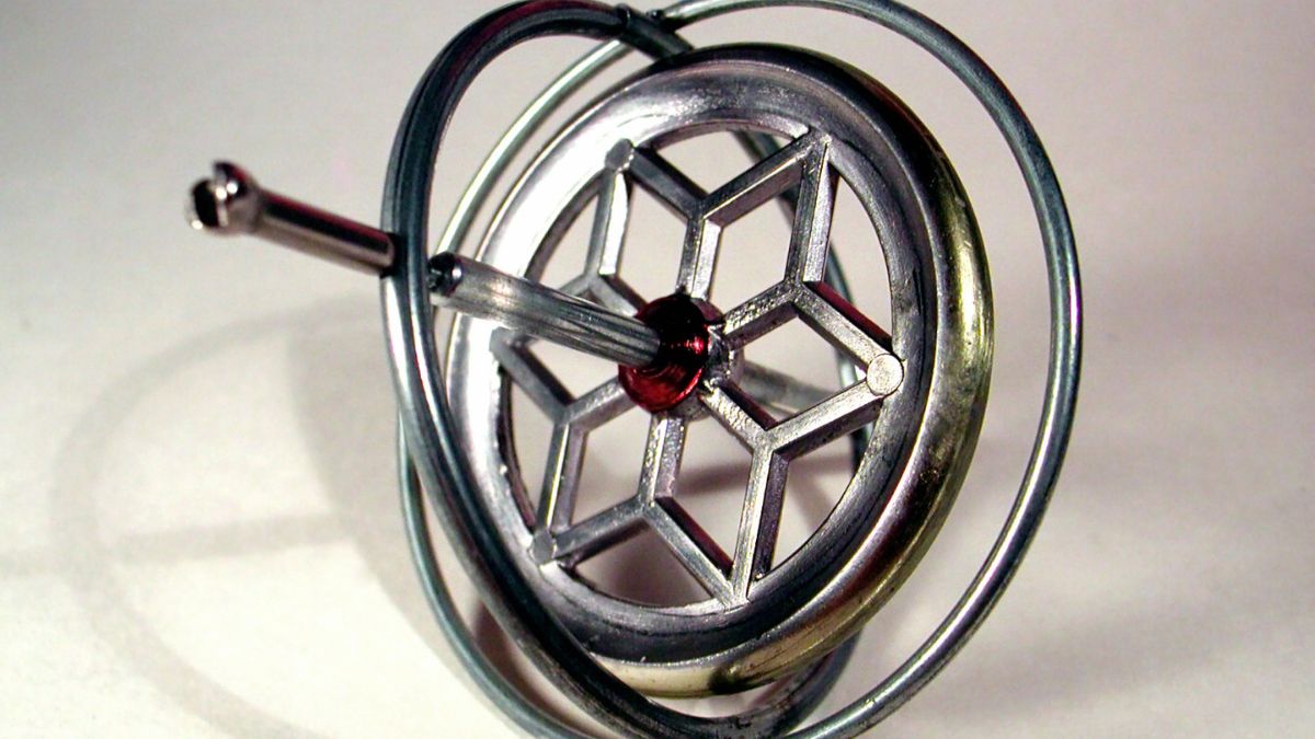 Gyroskop: Wie diese Technologie die moderne Welt verändert Ein Gyroskop mit einem metallischen Gehäuse und einer zentralen Achse.